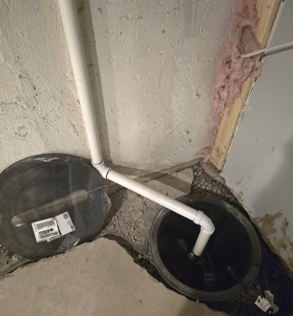 New sump pump installation in basement